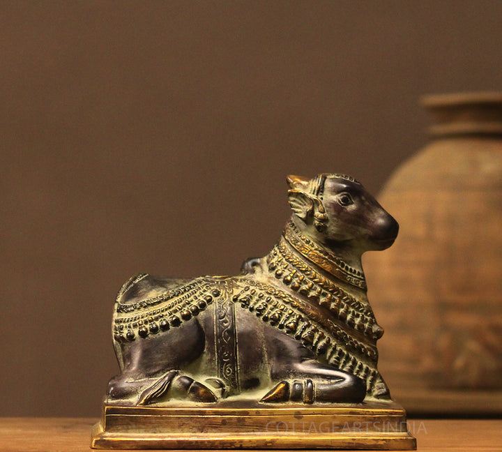 Brass Nandi In Antique Black Finish