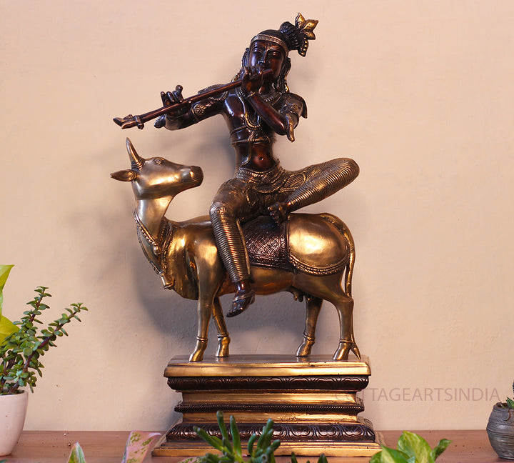 Brass Krishna Sitting On Cow 21”