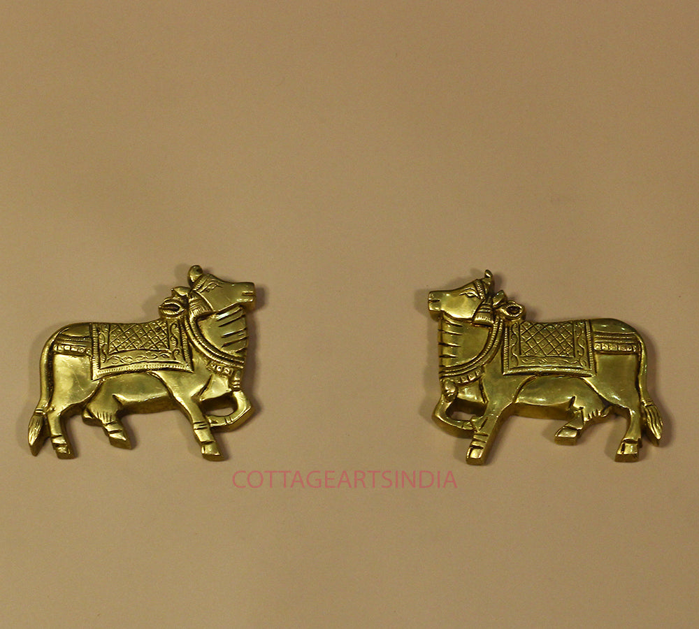 Brass Cow pair