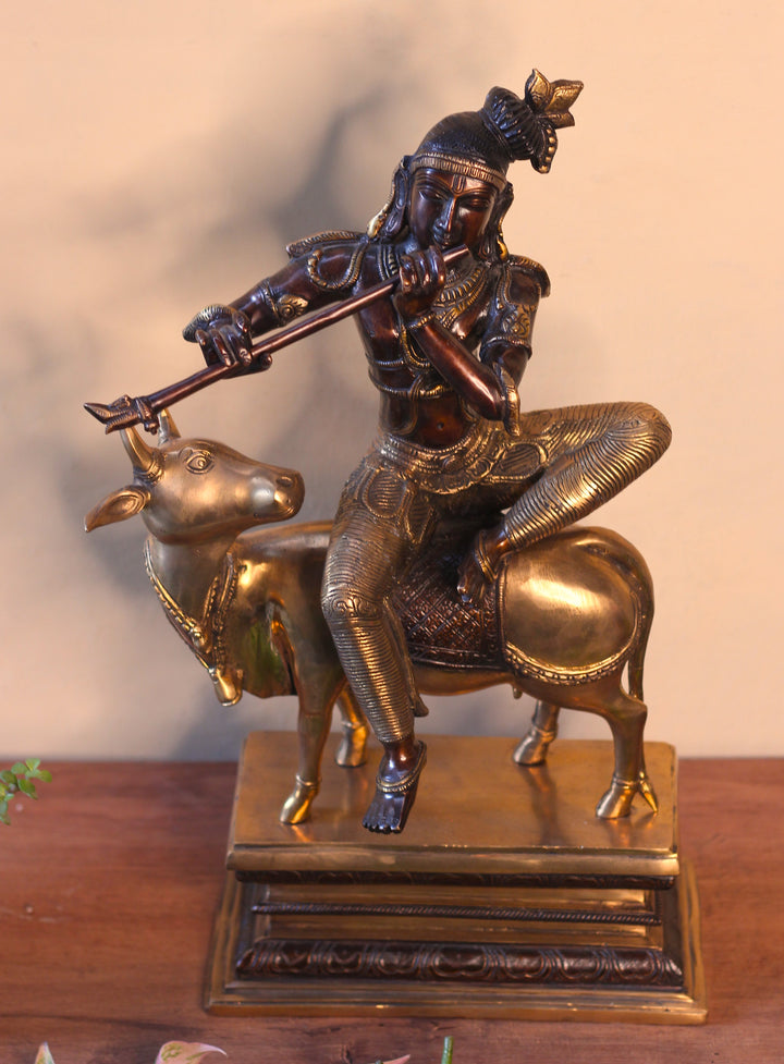 Brass Krishna Sitting On Cow 21”