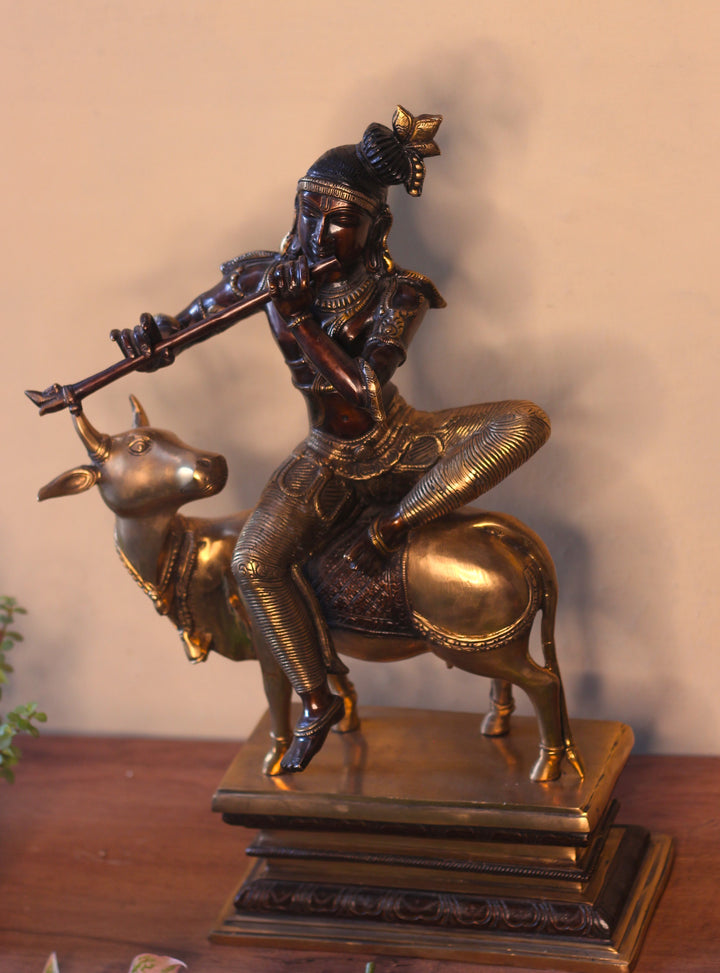 Brass Krishna Sitting On Cow 21”